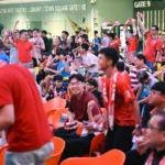 Singapore Lions players celebrating Asian Cup 2027 qualification at the National Stadium