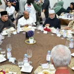 Cargo containers at a port as US tariffs change for Singapore exporters
