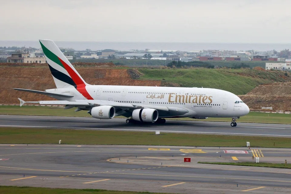 Emirates aircraft at Dubai International Airport during disruptions linked to the Gulf war